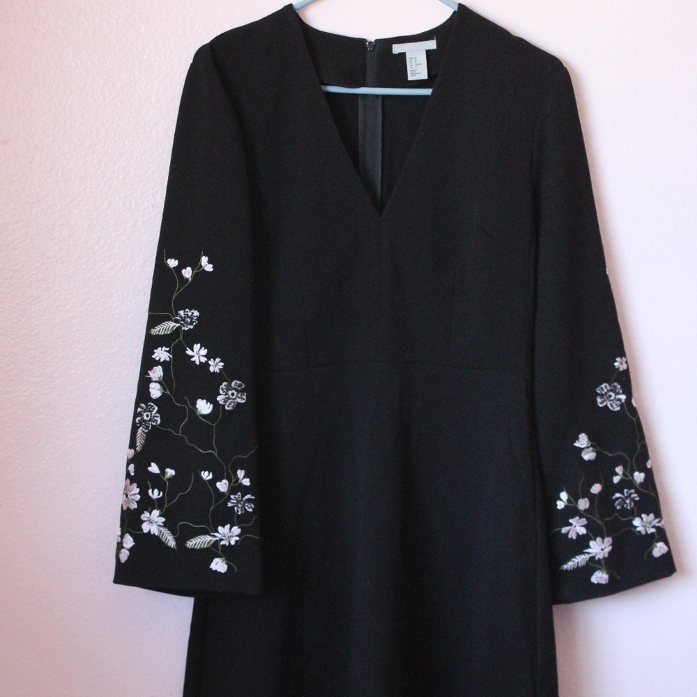 Black bell sleeved dress